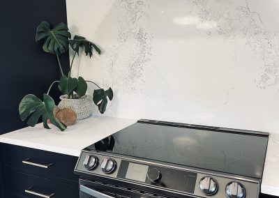 Kamloops Urban Cabinets blue cabinets marble backsplash