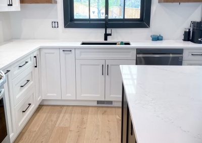 Kamloops Urban Cabinets white kitchen blue window
